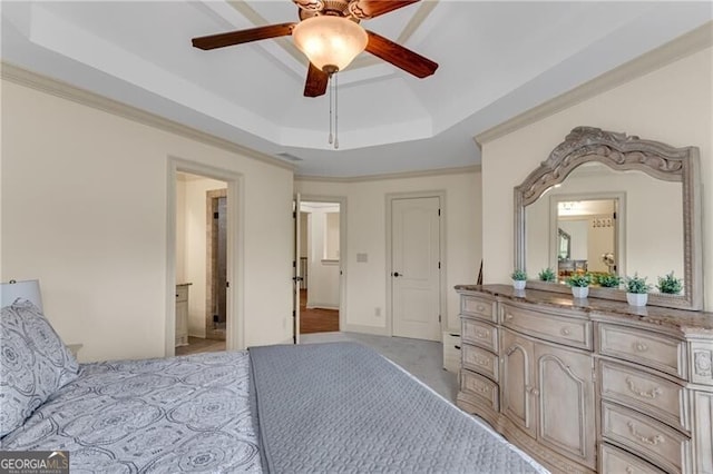 5861 Yoshino Cherry Ln, Braselton, GA 30517 - carpeted bedroom featuring a raised ceiling, crown molding, connected bathroom, and ceiling fan