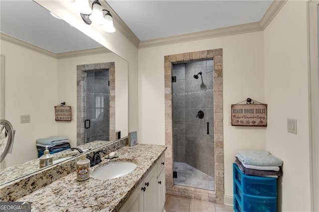 5861 Yoshino Cherry Ln, Braselton, GA 30517 - bathroom featuring vanity, a shower with door, ornamental molding, and tile patterned floors