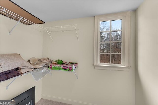5861 Yoshino Cherry Ln, Braselton, GA 30517 - walk in closet featuring carpet