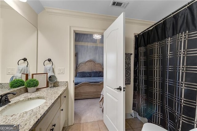 5861 Yoshino Cherry Ln, Braselton, GA 30517 - bathroom with tile patterned flooring, vanity, ornamental molding, and toilet
