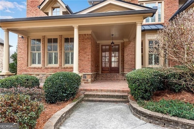 5861 Yoshino Cherry Ln, Braselton, GA 30517 - view of exterior entry featuring french doors and covered porch