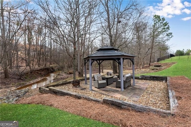 5861 Yoshino Cherry Ln, Braselton, GA 30517 - view of yard with a gazebo, a patio area, and a fire pit