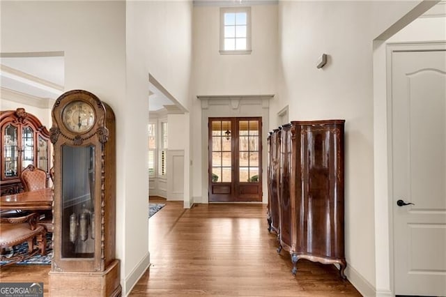 5861 Yoshino Cherry Ln, Braselton, GA 30517 - foyer with hardwood / wood-style floors, a towering ceiling, and french doors