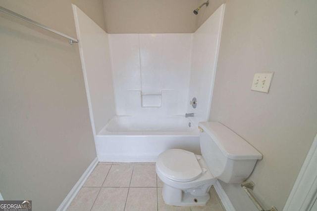 bathroom with tile patterned floors, toilet, and tub / shower combination