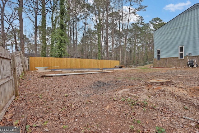 view of yard with fence