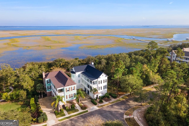 drone / aerial view with a water view