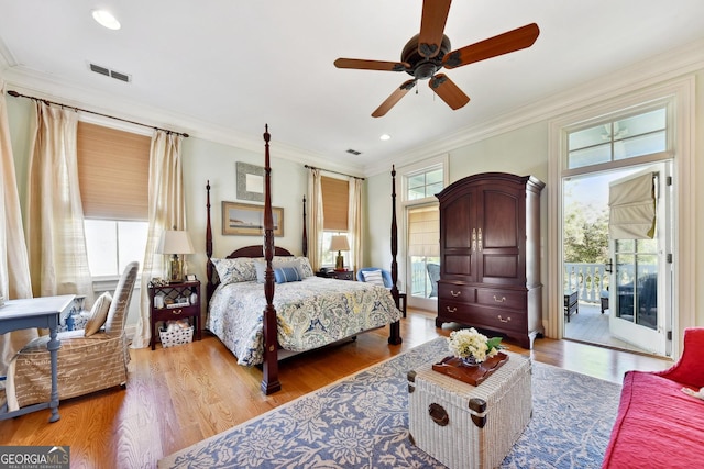 bedroom with crown molding, hardwood / wood-style floors, access to exterior, and ceiling fan