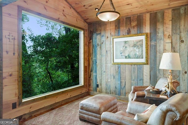 living area with vaulted ceiling, wooden ceiling, wood-type flooring, and wood walls