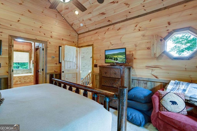 bedroom featuring high vaulted ceiling, wooden walls, and wooden ceiling