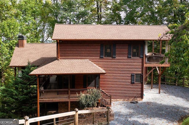 view of log cabin