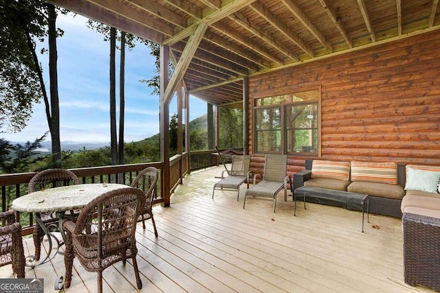 deck with outdoor lounge area