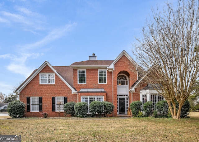 view of front facade with a front lawn