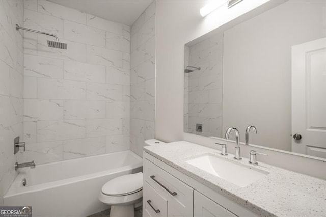 full bathroom featuring toilet,  shower combination, and vanity