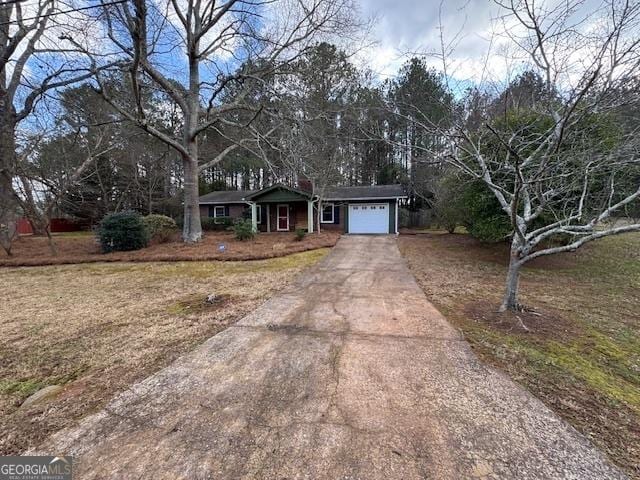 single story home with a garage