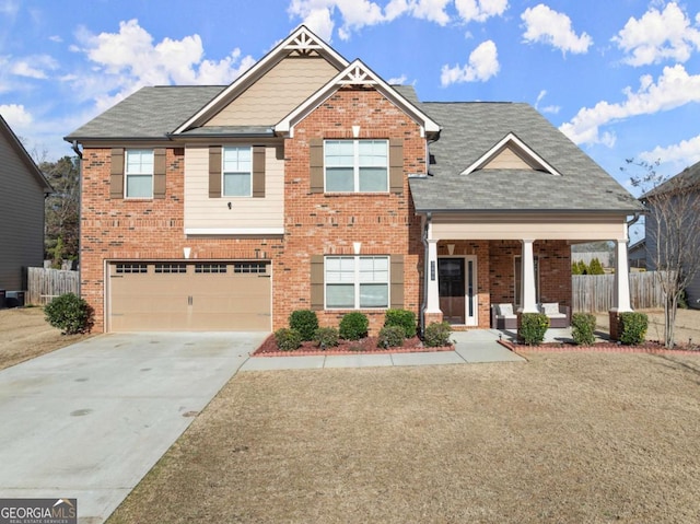 craftsman house featuring a porch, a garage, and a front yard