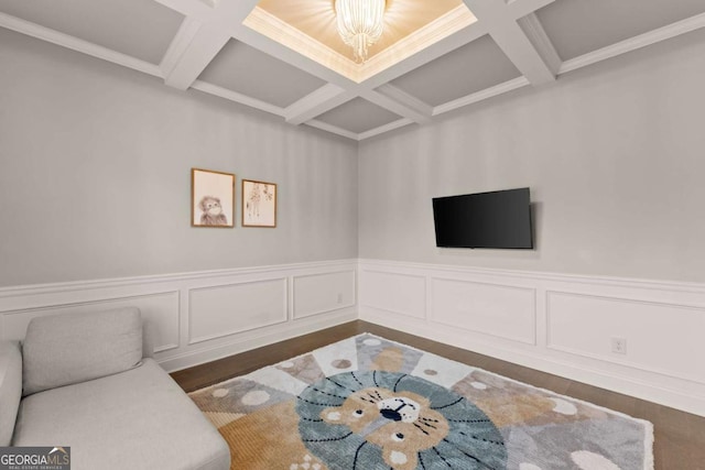 living room with coffered ceiling, dark hardwood / wood-style floors, and beam ceiling