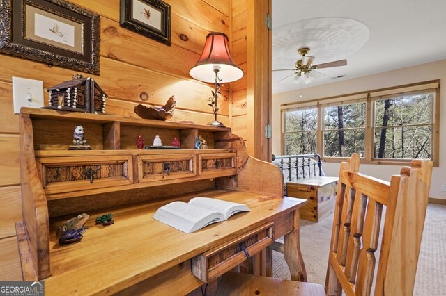 dining area with ceiling fan, carpet floors, and visible vents