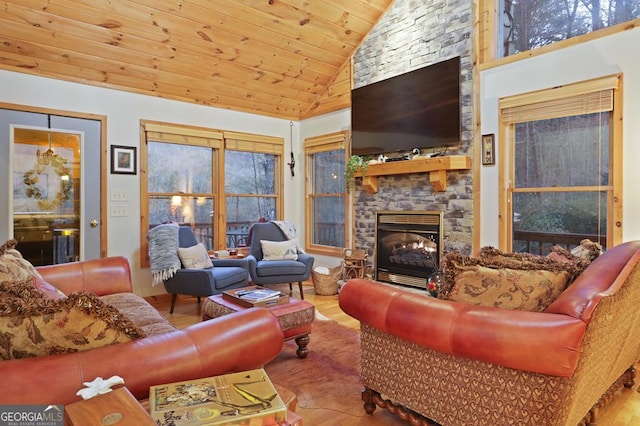 living area featuring high vaulted ceiling, a fireplace, wooden ceiling, and wood finished floors