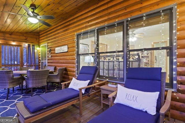 sunroom / solarium with wood ceiling and ceiling fan