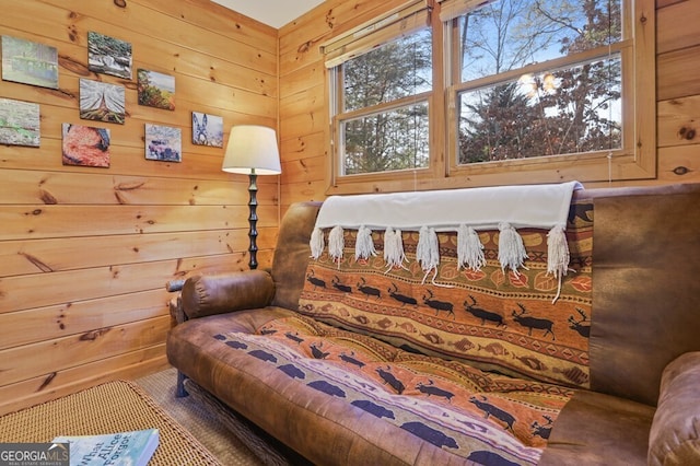 bedroom with wood walls