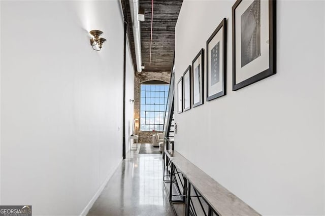 hallway featuring concrete floors