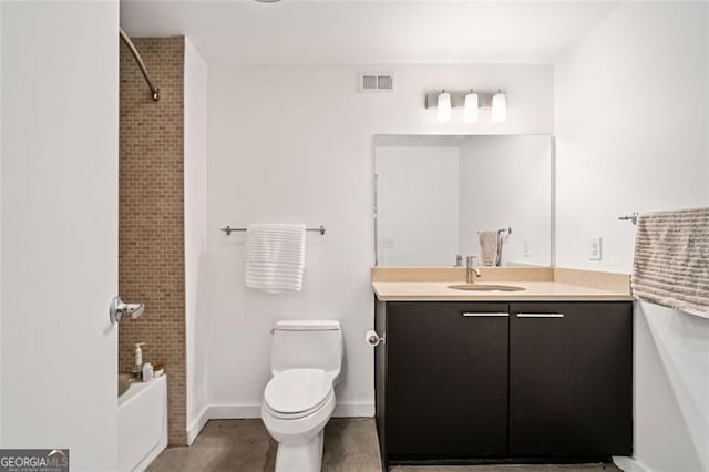 full bathroom with vanity, bathtub / shower combination, and toilet