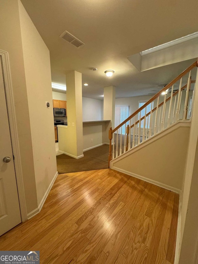 interior space with light hardwood / wood-style floors