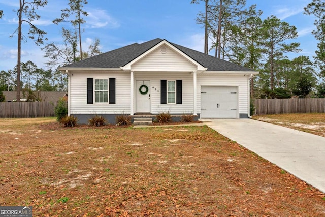 ranch-style house with a garage and a front lawn