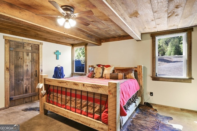 bedroom featuring wood ceiling, ceiling fan, beam ceiling, and multiple windows