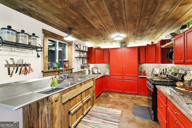 kitchen featuring sink, wood ceiling, stainless steel counters, stainless steel range with gas stovetop, and tasteful backsplash