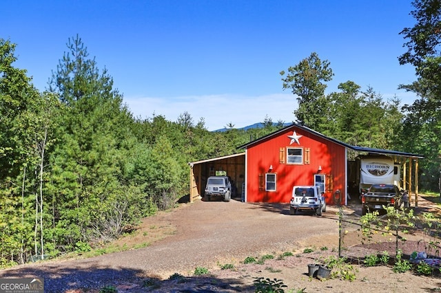 view of outdoor structure featuring a carport