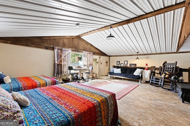 bedroom with vaulted ceiling and carpet flooring