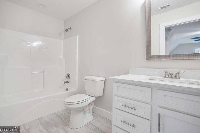 full bathroom featuring vanity, shower / bathtub combination, and toilet