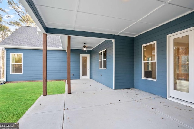 view of patio featuring ceiling fan