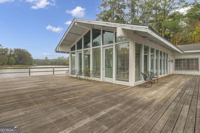 wooden terrace with a sunroom