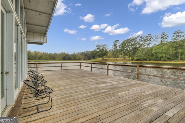 dock area with a deck with water view