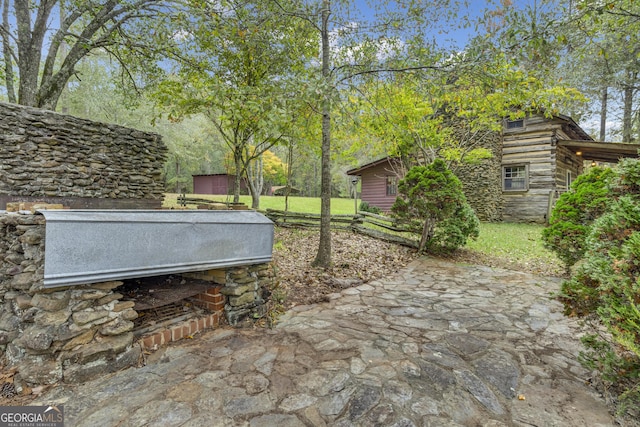 view of yard featuring a patio area and fence