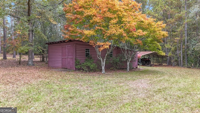 2724 Barnesville Hwy, Thomaston, GA 30286 - view of green lawn with a storage shed and a carport