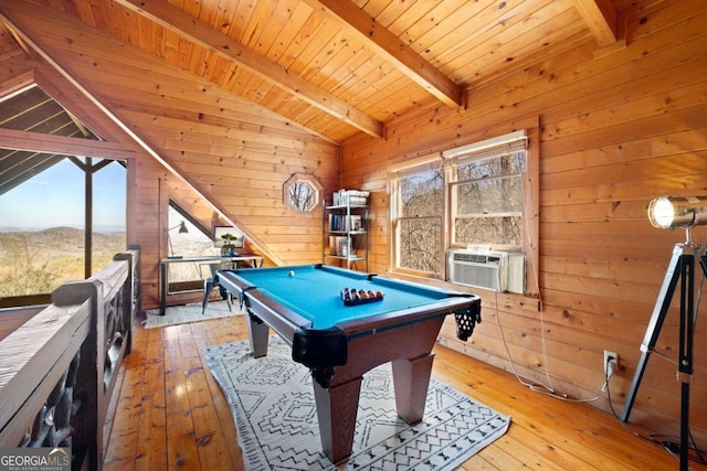 playroom with lofted ceiling with beams, wooden walls, wooden ceiling, and light hardwood / wood-style floors