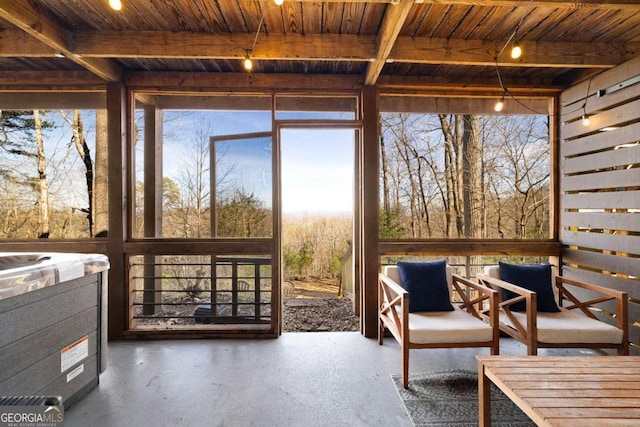 sunroom / solarium featuring wooden ceiling and beam ceiling