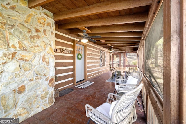 interior space featuring ceiling fan