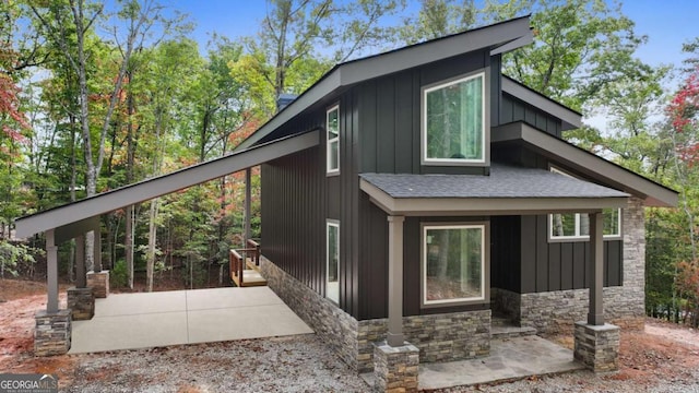 view of property exterior featuring a patio area