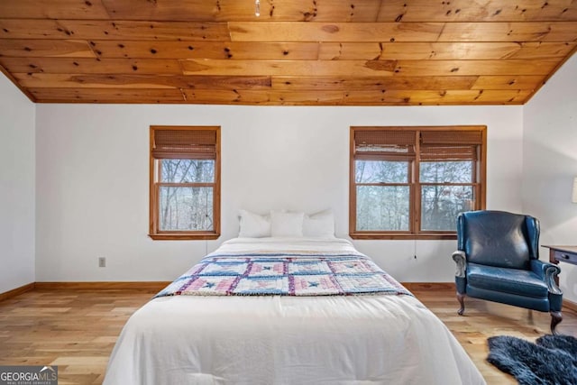 380 Oak Ridge Way, Morganton, GA 30560 - bedroom featuring wood ceiling, multiple windows, wood finished floors, and baseboards