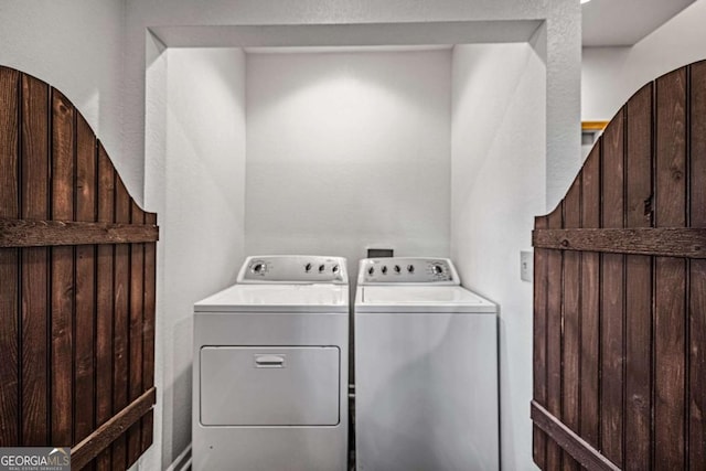 laundry area featuring independent washer and dryer