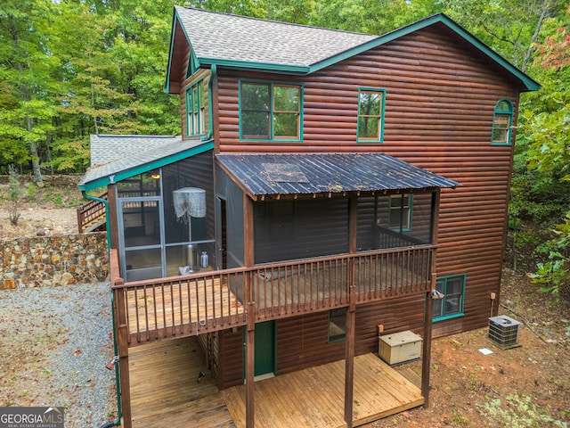 380 Oak Ridge Way, Morganton, GA 30560 - rear view of property with a sunroom, a shingled roof, faux log siding, and a deck