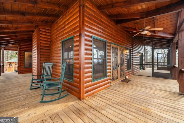 wooden deck with ceiling fan