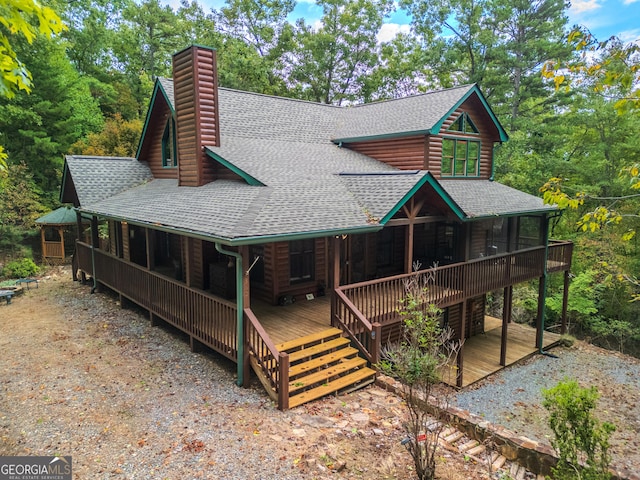 380 Oak Ridge Way, Morganton, GA 30560 - rear view of house featuring a shingled roof, a chimney, faux log siding, and a porch