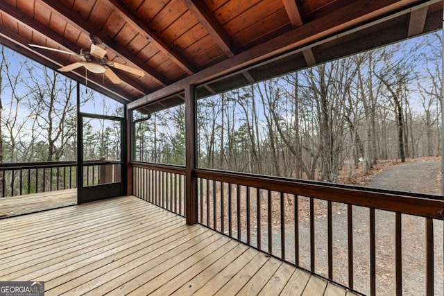 wooden deck featuring ceiling fan