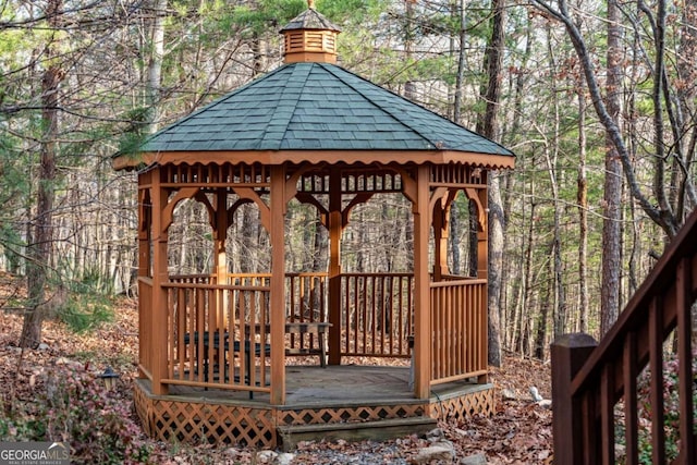 wooden deck featuring a gazebo