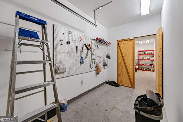 380 Oak Ridge Way, Morganton, GA 30560 - misc room with a workshop area and unfinished concrete floors